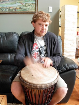 Jordan playing the Djembe. (Photo © Kim Goldberg)