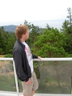 From his balcony, Jordan surveys the rugged rural terrain of East Sooke, and the Juan de Fuca Strait beyond. (Photo © Kim Goldberg 2013)